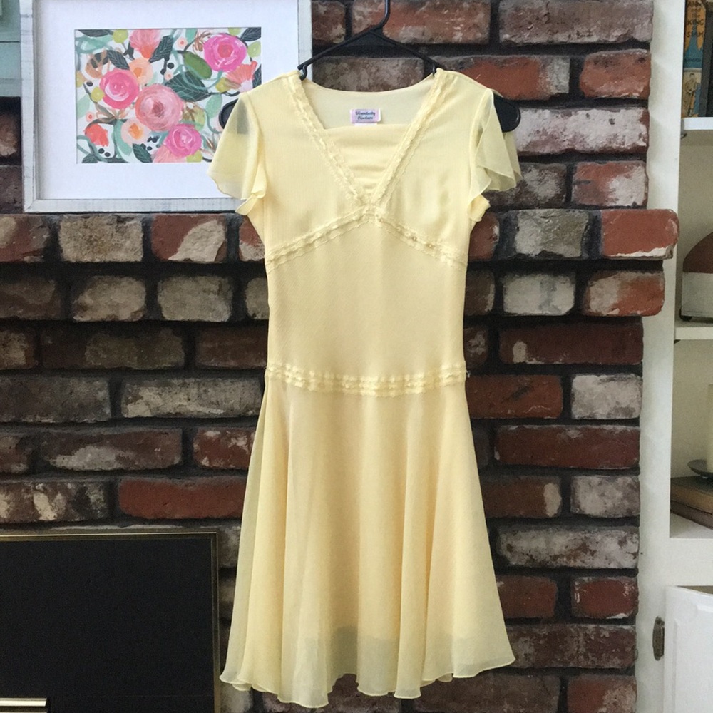 Girl’s yellow dress